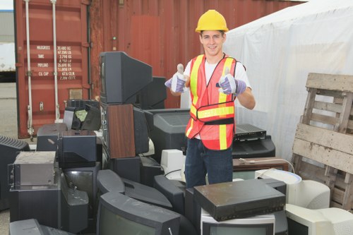 Professional team clearing garage clutter in South East London