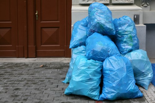 Waste removal trucks in South East London streets